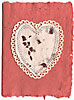 recycled paper with rose petals and lace trimmed heart