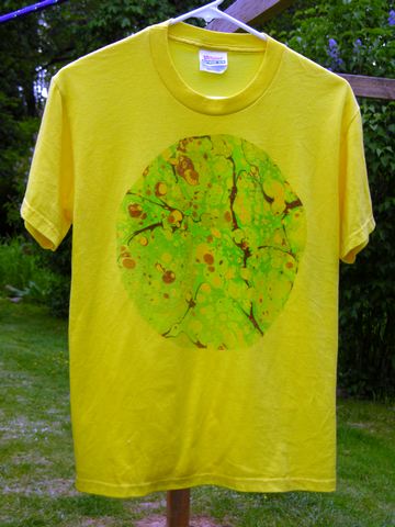 Green stonein circle print marbled t-shirt from plain paper and fabric company