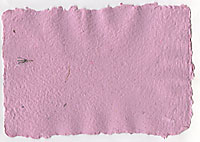 Light magenta, almost pink colored recycled office paper with lavender buds and flower petals as inclusions